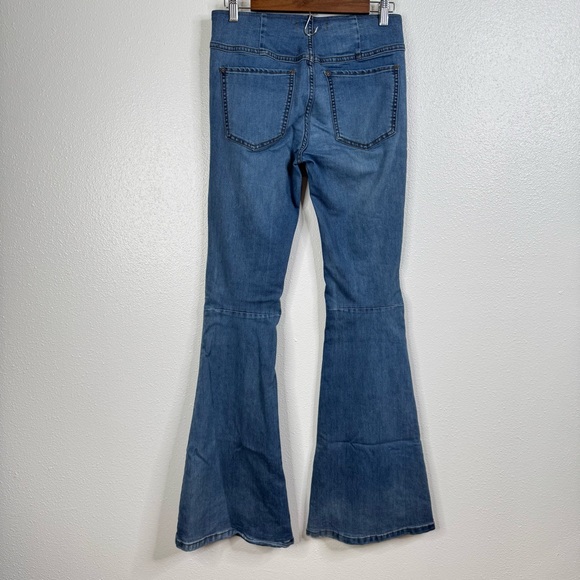 We The Free Penny Pull On Flare Jeans Size 27 - Picture 2 of 6